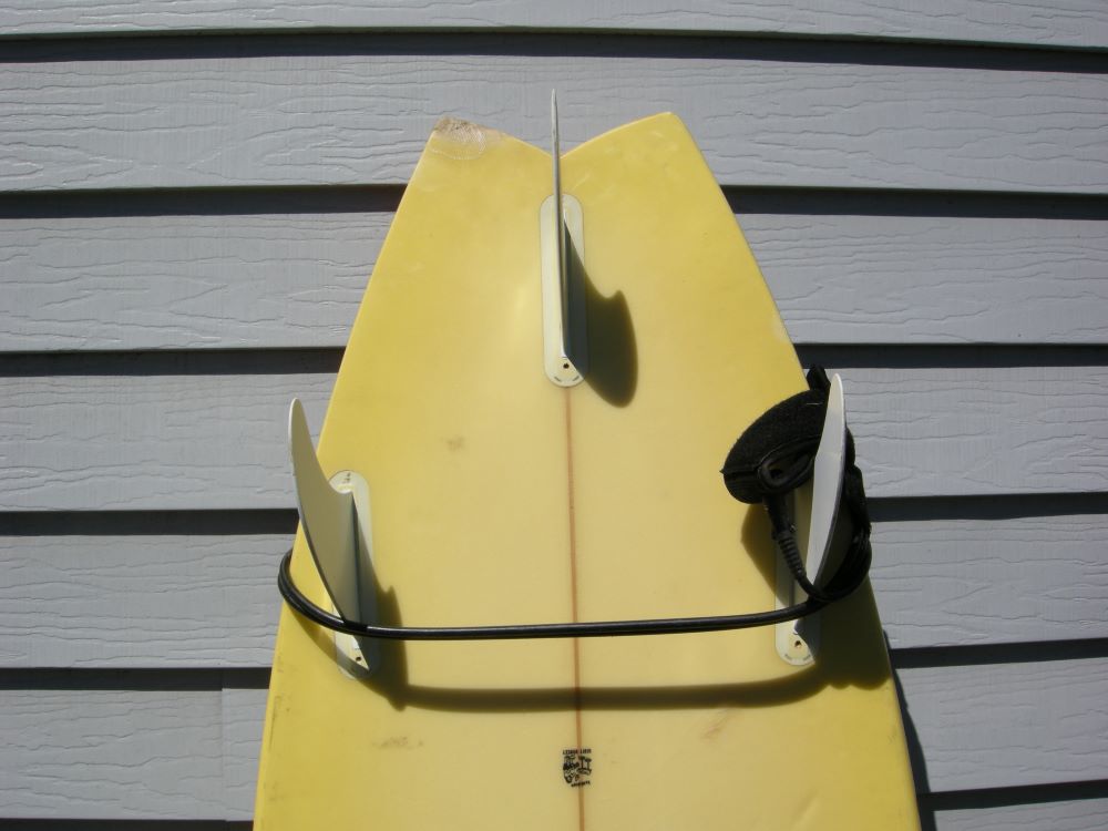 Surfboard tail and fins