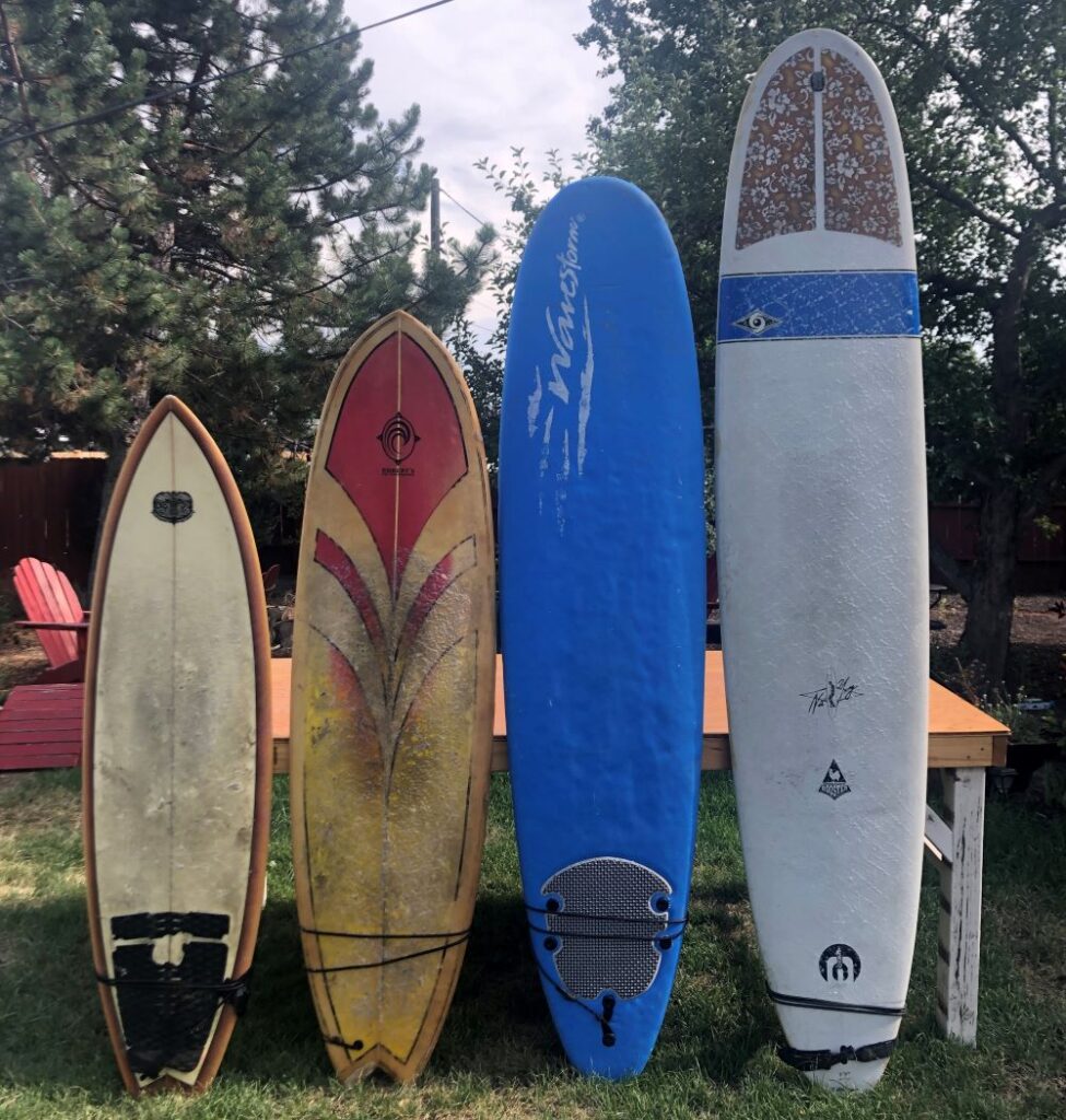 surfboards of different sizes and shapes